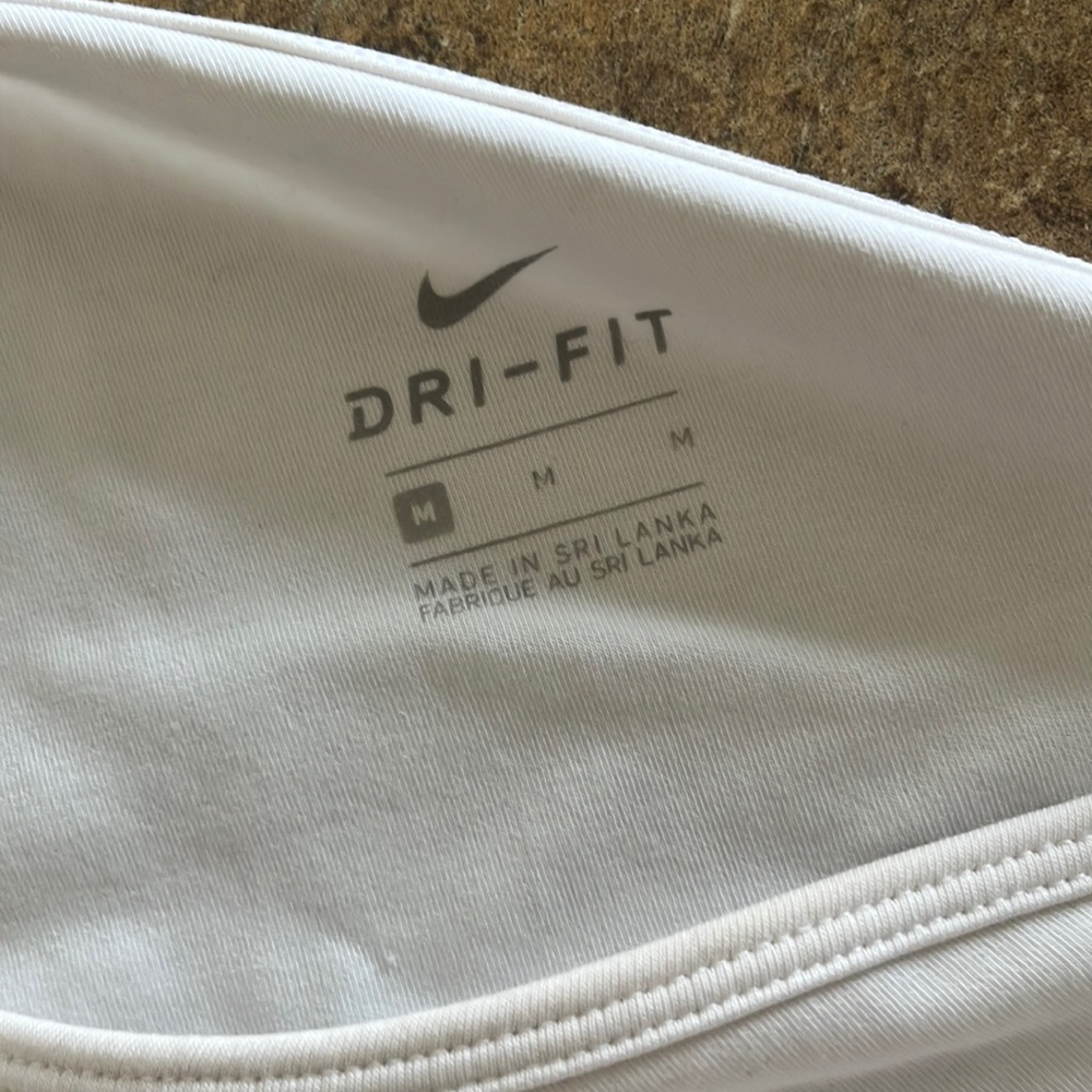 Nike size medium, bodysuit, shoulder strap